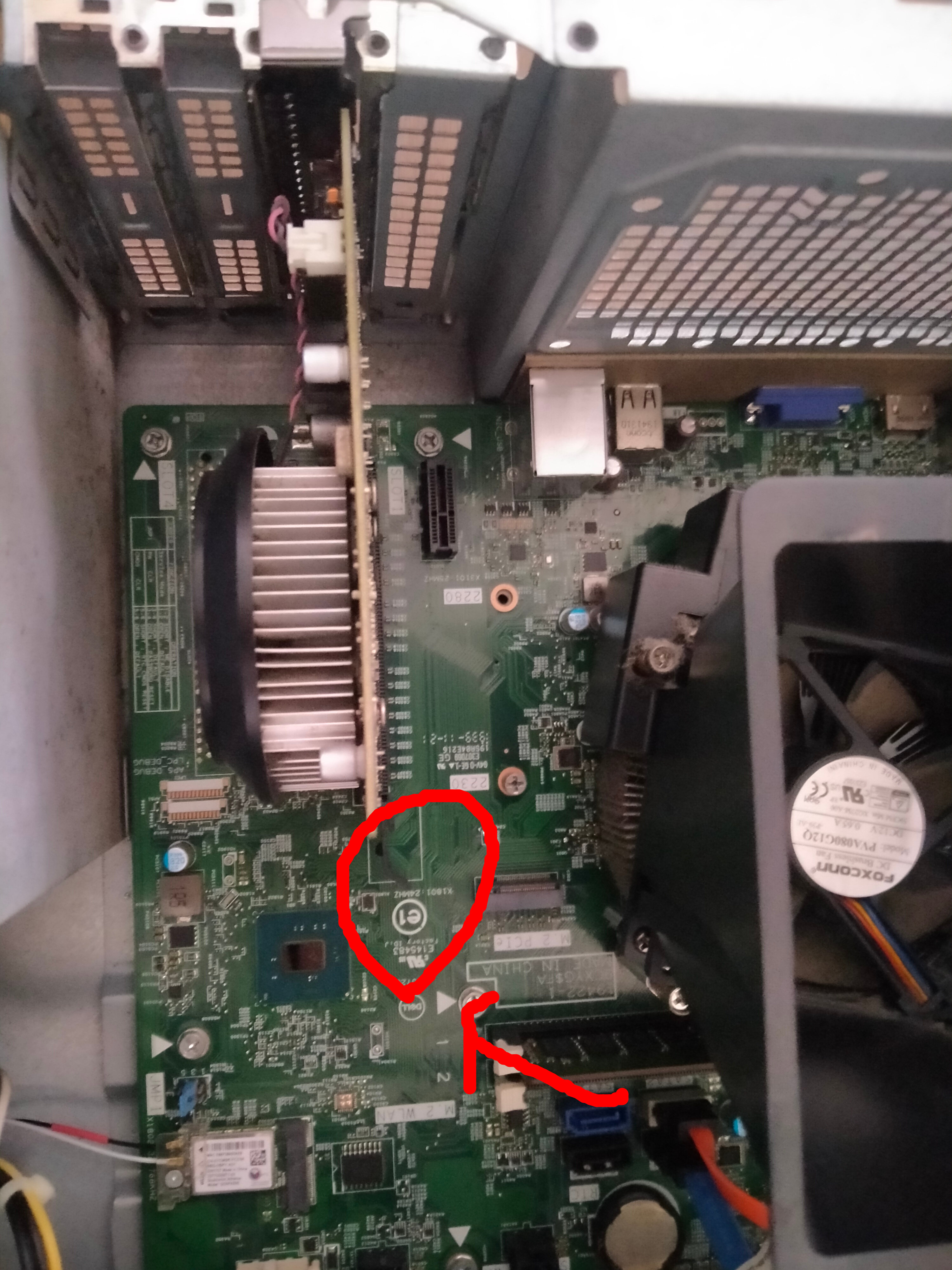 IMAGE OF DELL INSPIRON 3671 GRAPHICS CARD NEXT TO THE CONE-SHAPED CPU FAN